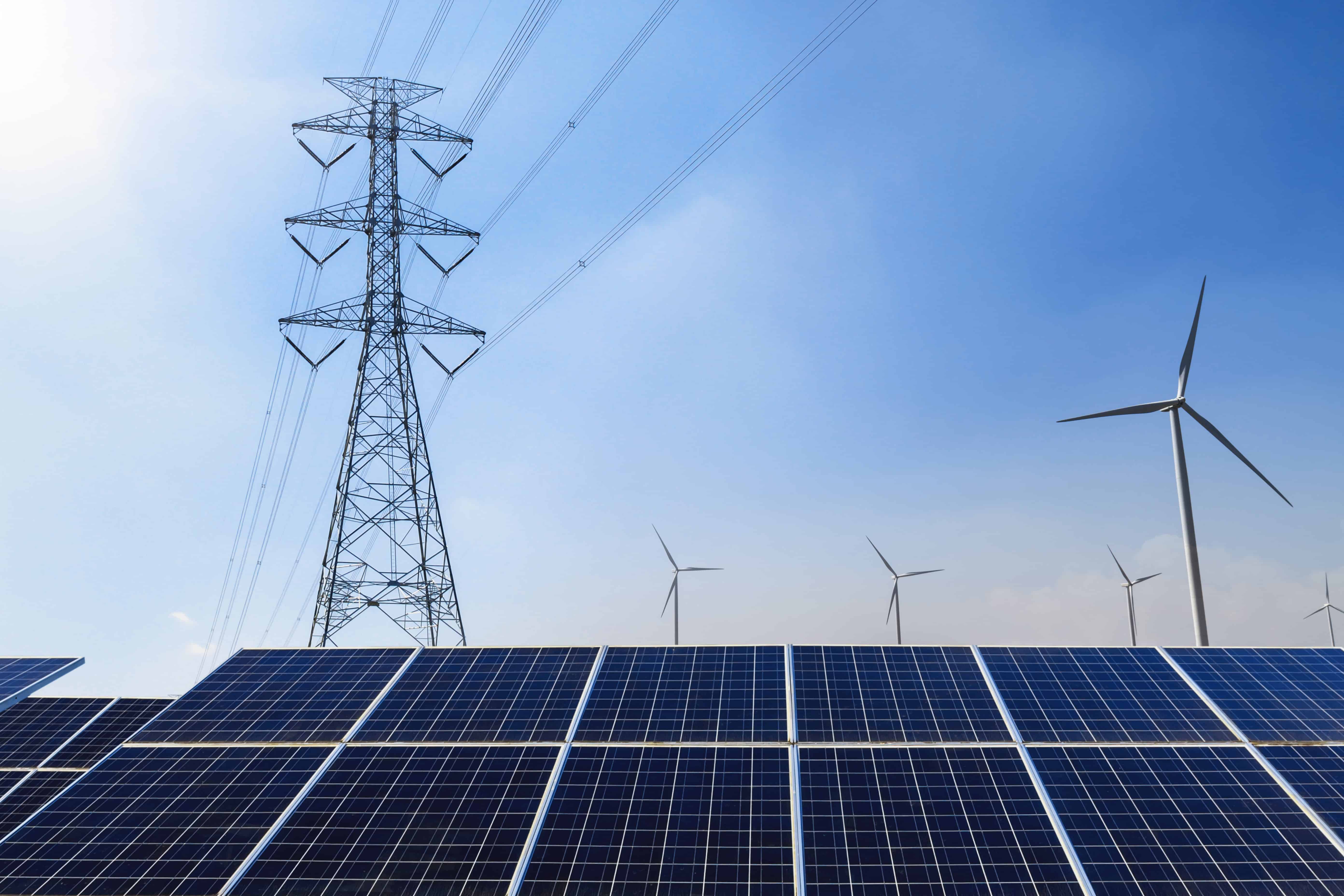 Solar Panels With Electricity Pylon Wind Turbine Clean Power Energy Concept